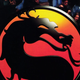 Promotional art for Mortal Kombat shows the dragon logo overtop of people cheering.